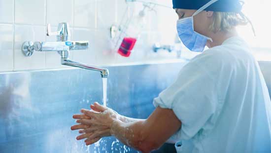 Doctor-washing-hands-550x310