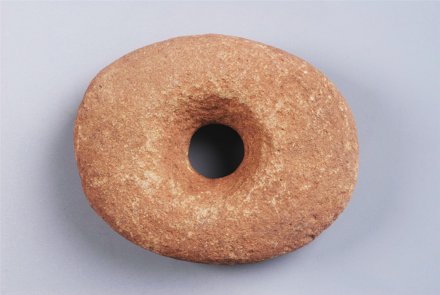 原始时期穿孔石器-桂北民俗博物馆藏