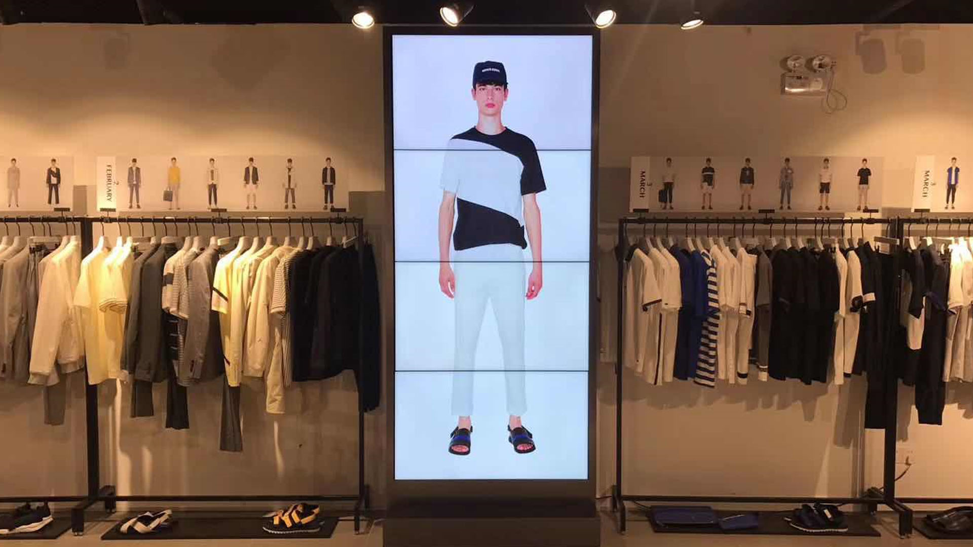 Mr.C男装门店显示屏设置了55英寸3X1一组作为衣服新品展示大屏幕
