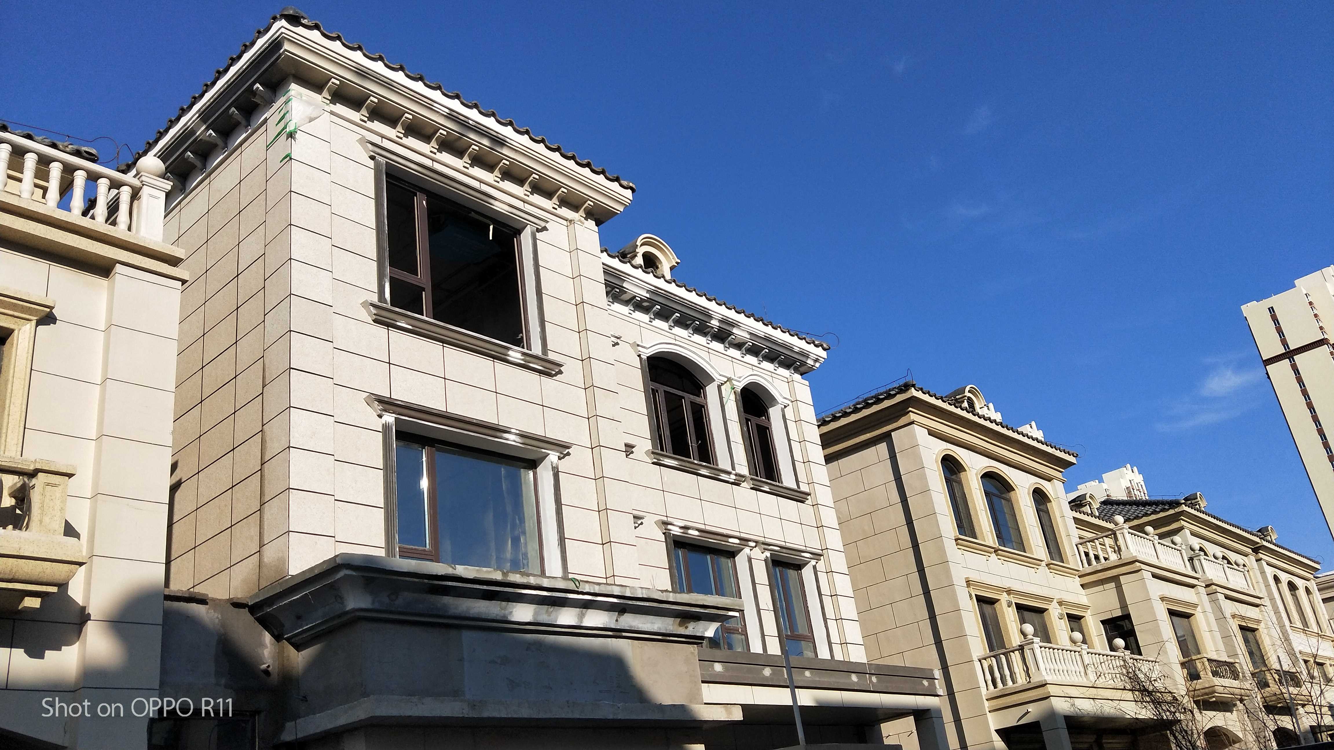 保定宏孚庄园真岩石聚苯保温装饰一体板上墙案例