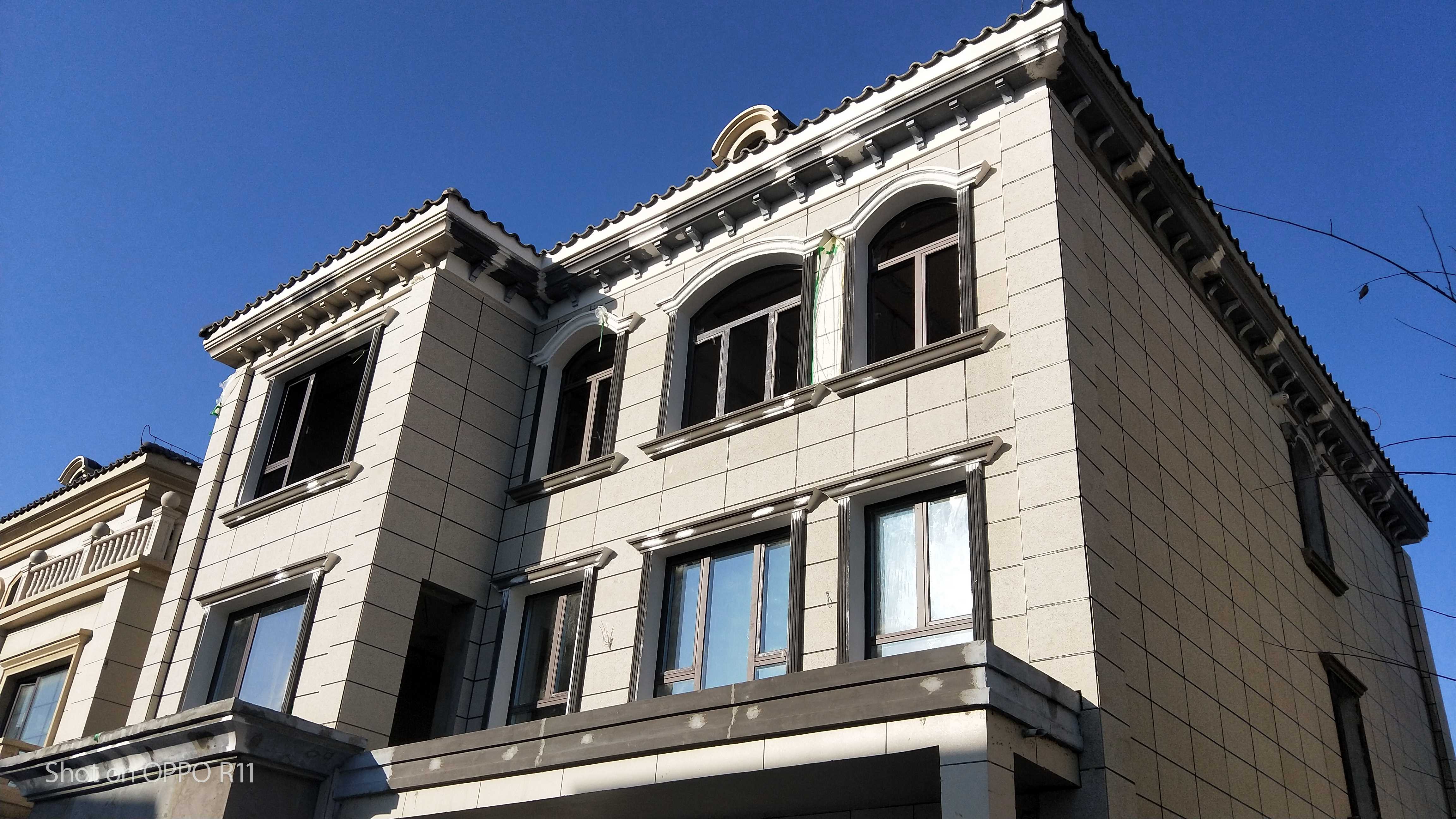 保定宏孚庄园真岩石聚苯保温装饰一体板上墙案例