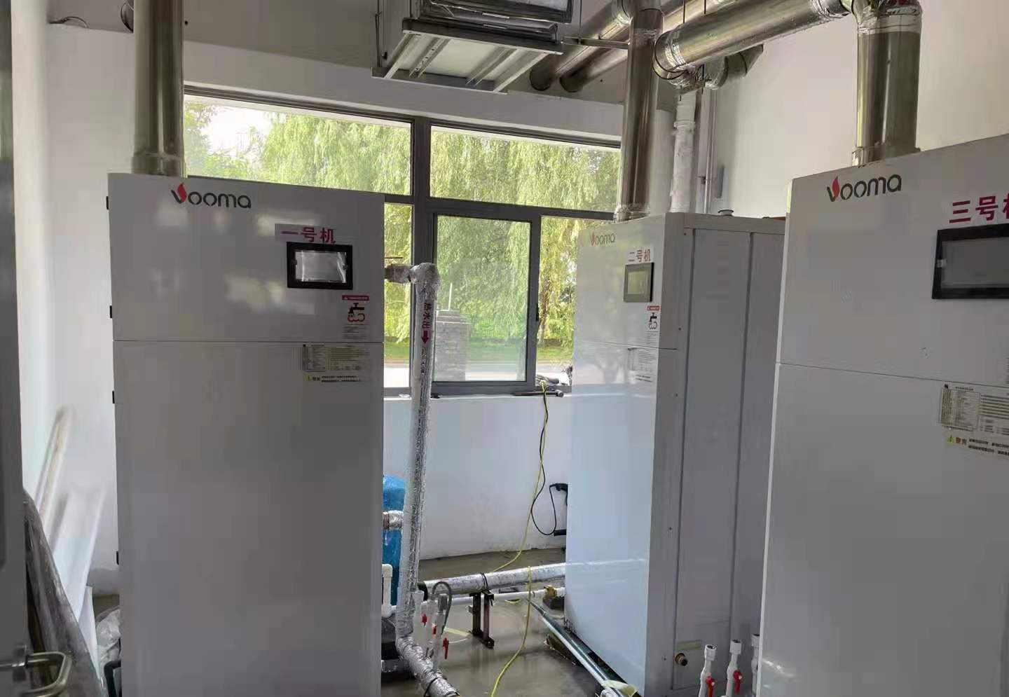 上海的人工温泉辅助加热系统用哪种热水设备？