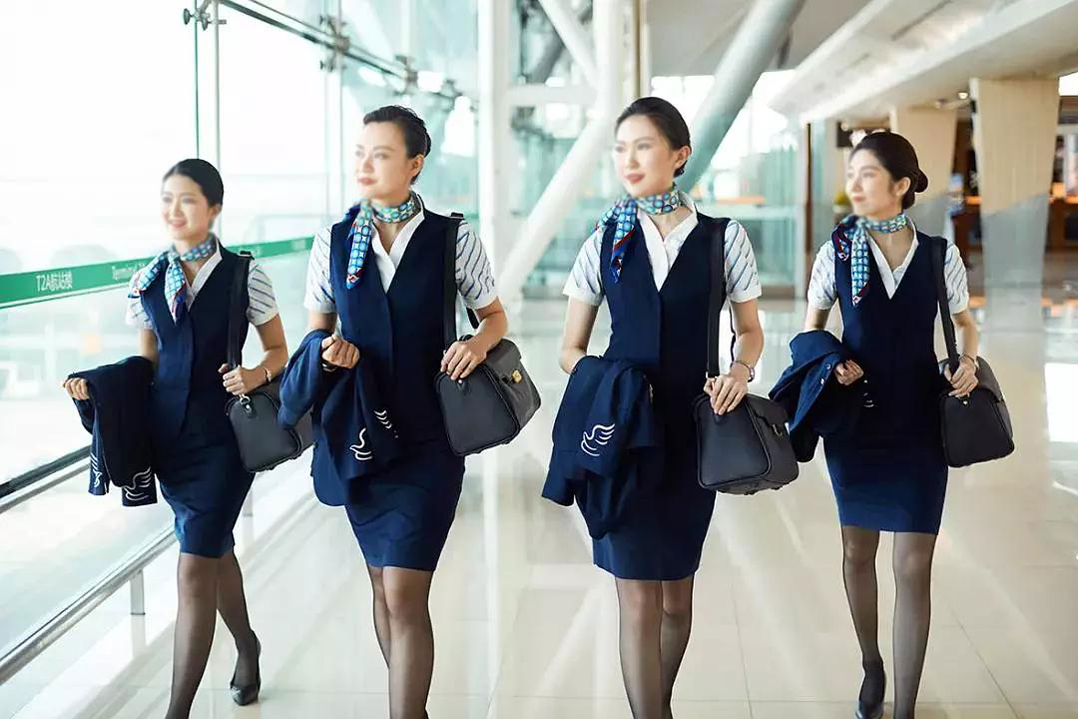 泰国酷鸟航空空姐制服_制式服装-中国时尚制服设计网