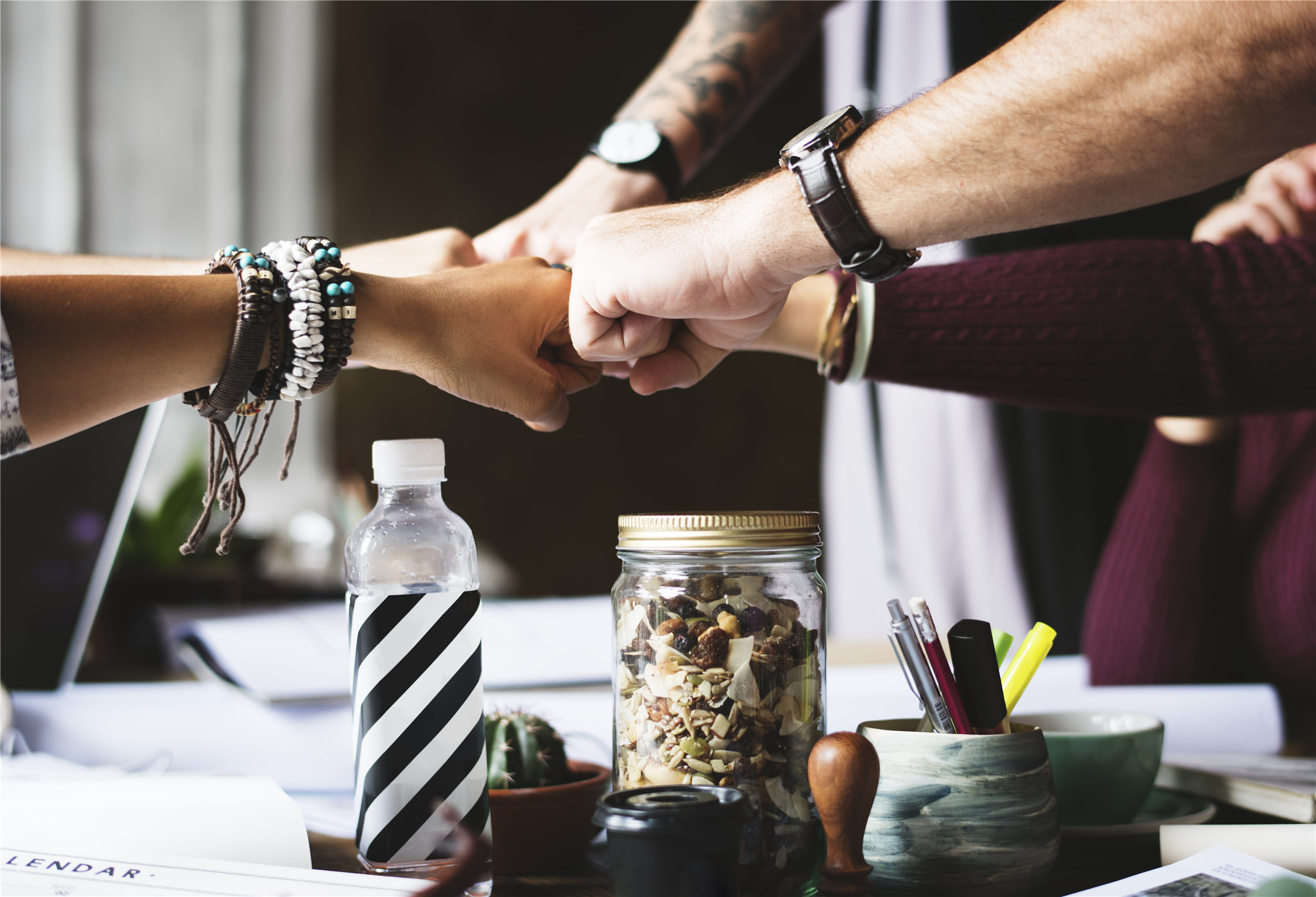 colleagues-cooperation-fist-bump-fists-71f42f94d286f295478f6b3e65e46574