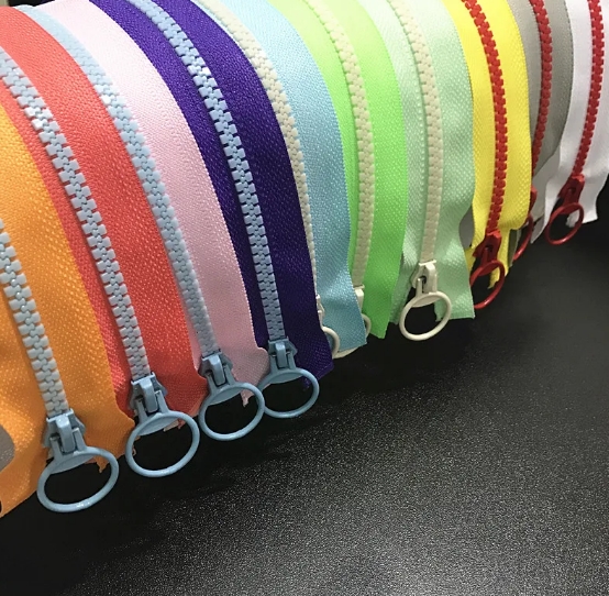 Colorful molded plastic zipper