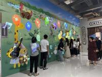 5墙面互动投影：该系统使用感应摄像头，通过投影让来宾与墙面产生互动。来宾触摸或者挥舞时，画面会与来宾产生互动，可定制开发