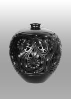 龙山黑陶百花团圆罐
