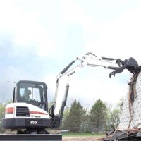 山猫-美国E55W-轮式小型挖掘机